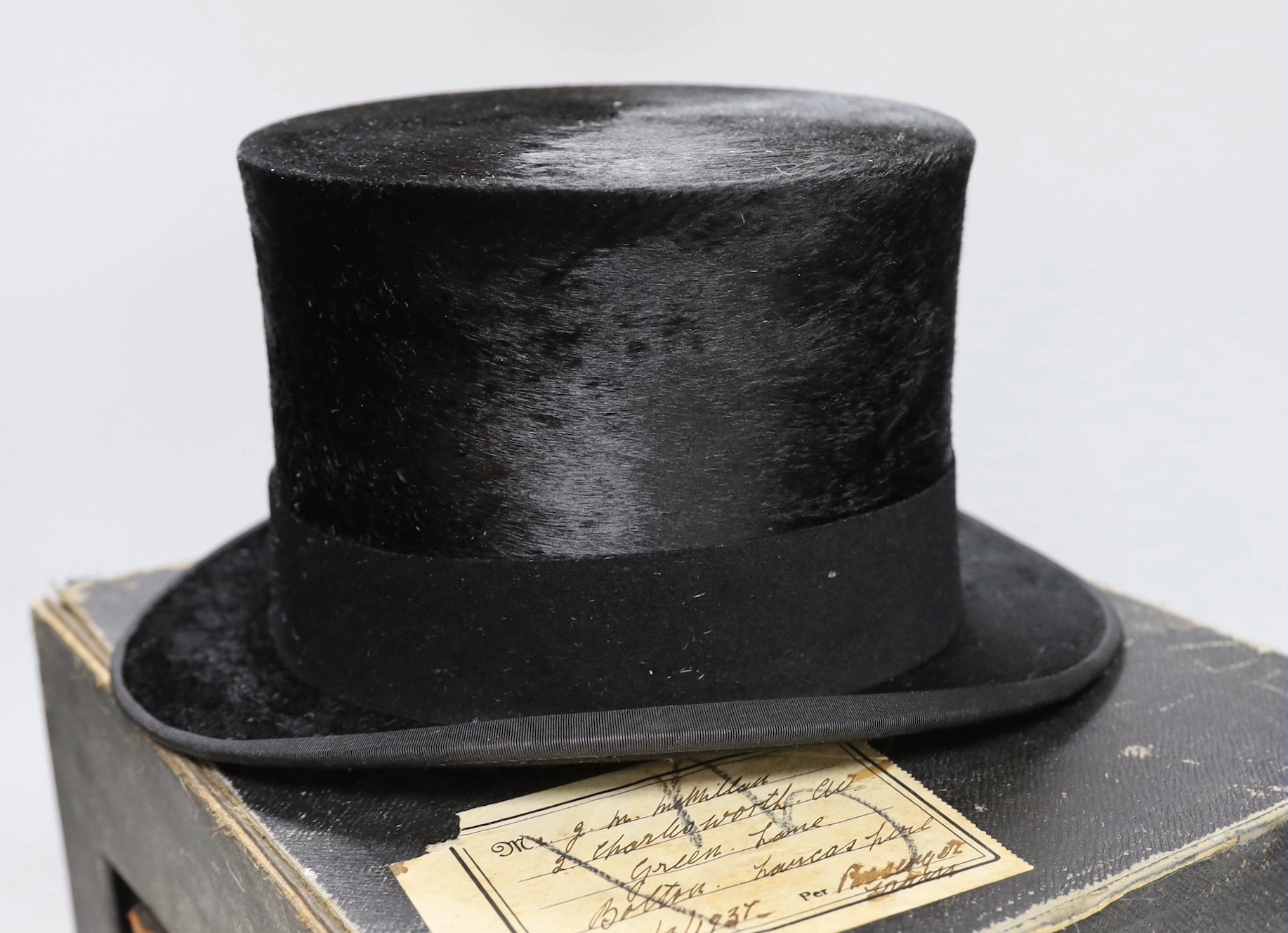 A boxed gentleman's black top hat, by Royal appointment: Woodrow, 45 Gordon St. Glasgow